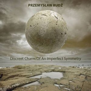 Przemysław Rudź - Discreet Charm of an Imperfect Symmetry