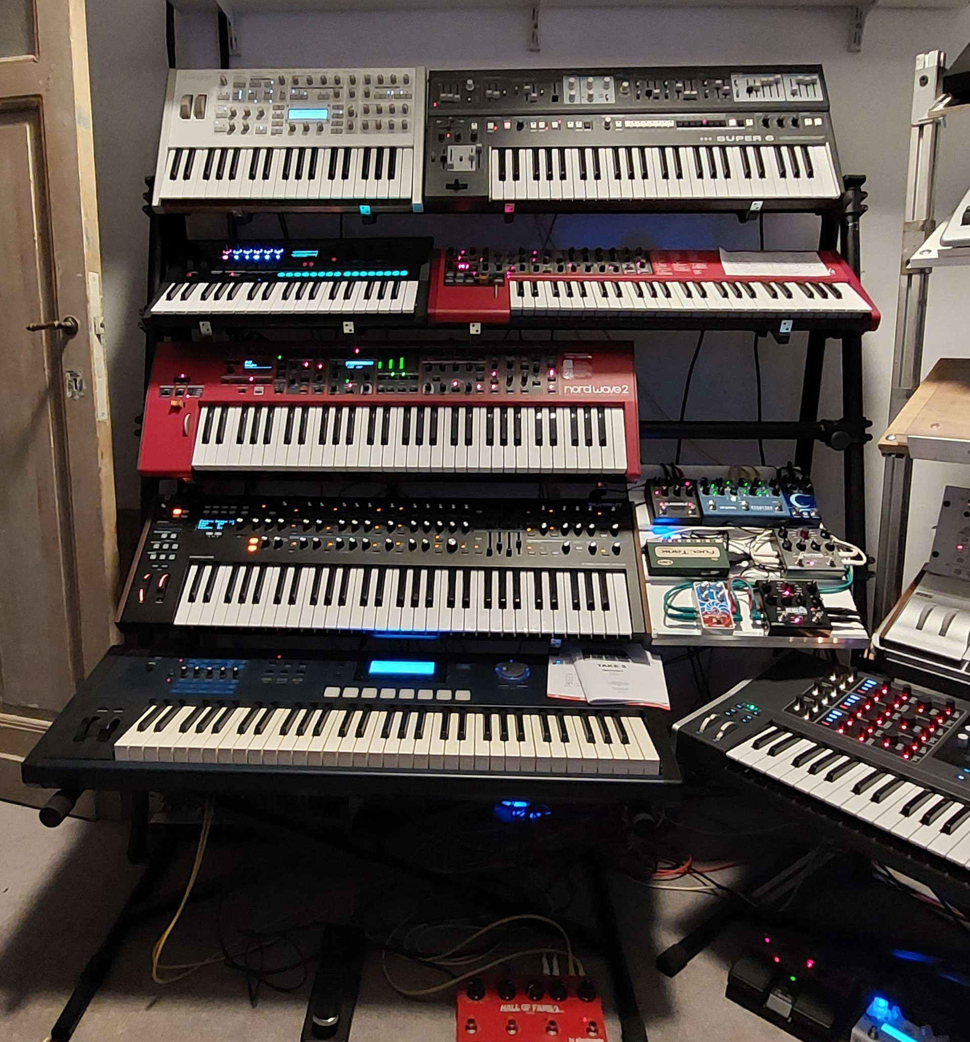 From top to bottom: Virus Indigo, UDO super 6, Korg OPSIX, Nord lead 4, Nord Wave 2, Novation Summit, Kurzweil PC